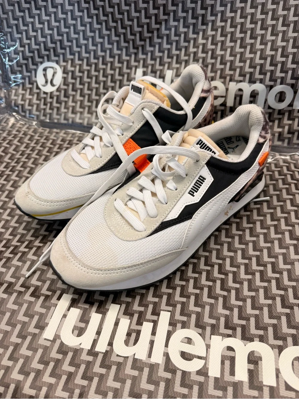 Puma White and Black Retro-Inspired Women's Sneaker with Yellow Accents